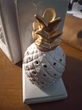 Z-pineapple book ends.